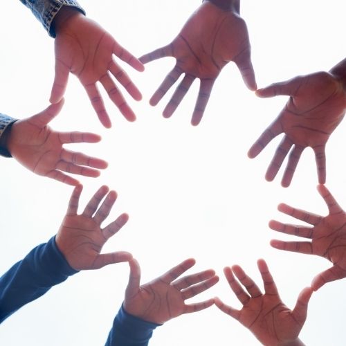 9 Tips Grow Your Circle Of Influence And Be A Better Leader Image of hands in a circle representing circle of influence.