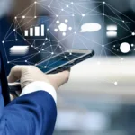 Business man using a cellphone to be more productive.