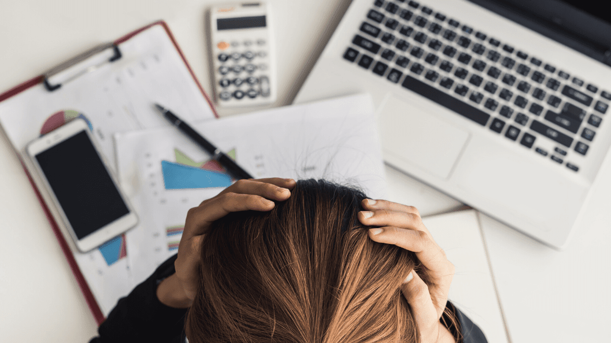 Stressed out woman at work.