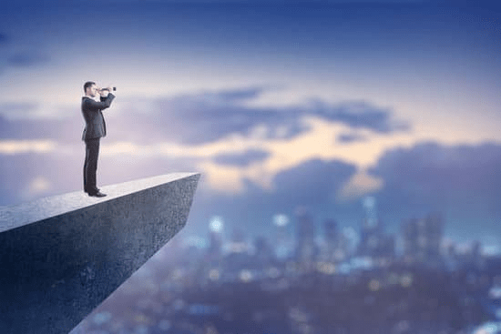 55 Quotes for Vision, Integrity, Communication, Change, Problem-Solving Man looking over town representing vision for the Quotes on Vision section.