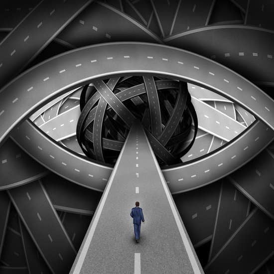 10 Proven Types Of Leadership Styles That Will Get Results Image of a man walking into an eye representing visionary leadership style