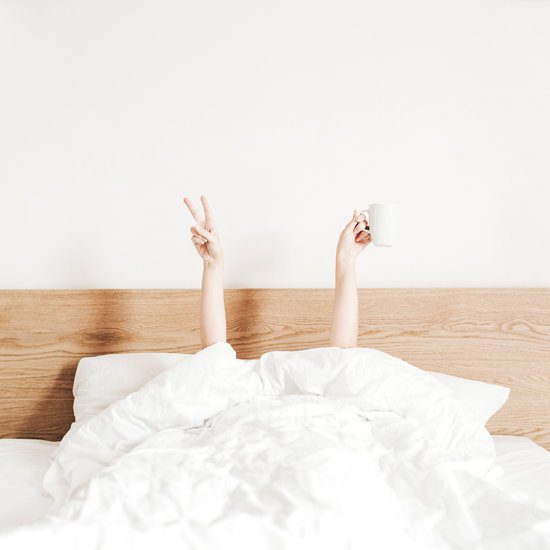 15 Work From Home Tips And Tricks To Be Successful Image of a person getting out of bed for the work from home morning routine tip.