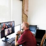 Image of a virtual team on a video chat for challenges of virtual teams article.