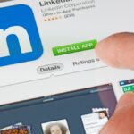 Image of person installing LinkedIn app for LinkedIn profile tips and checklist article.
