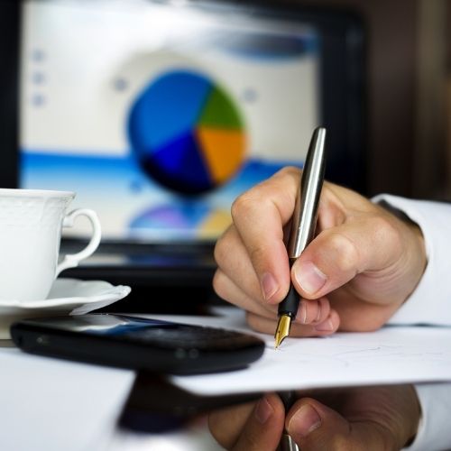 Managing And Improving Processes For Unbelievably Successful Operations Image of person creating a draft of a process.