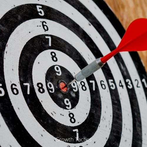 What Is The Law Of Attraction And Why Does Oprah Winfrey Use It Daily To See Huge Success In Her Life Image of dart board with a bullseye hit.