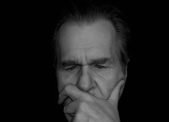 13 New Supervisor Tips to Get Started On the Right Foot Image of a man with his hands on his chin thinking about what decision to make representing new supervisor, boss, leader, manager, first time supervisor overthinking.
