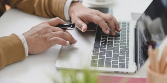 25 Free Personal and Professional Development Resources Image of a person working on a computer possibly on a personal or professional development site.