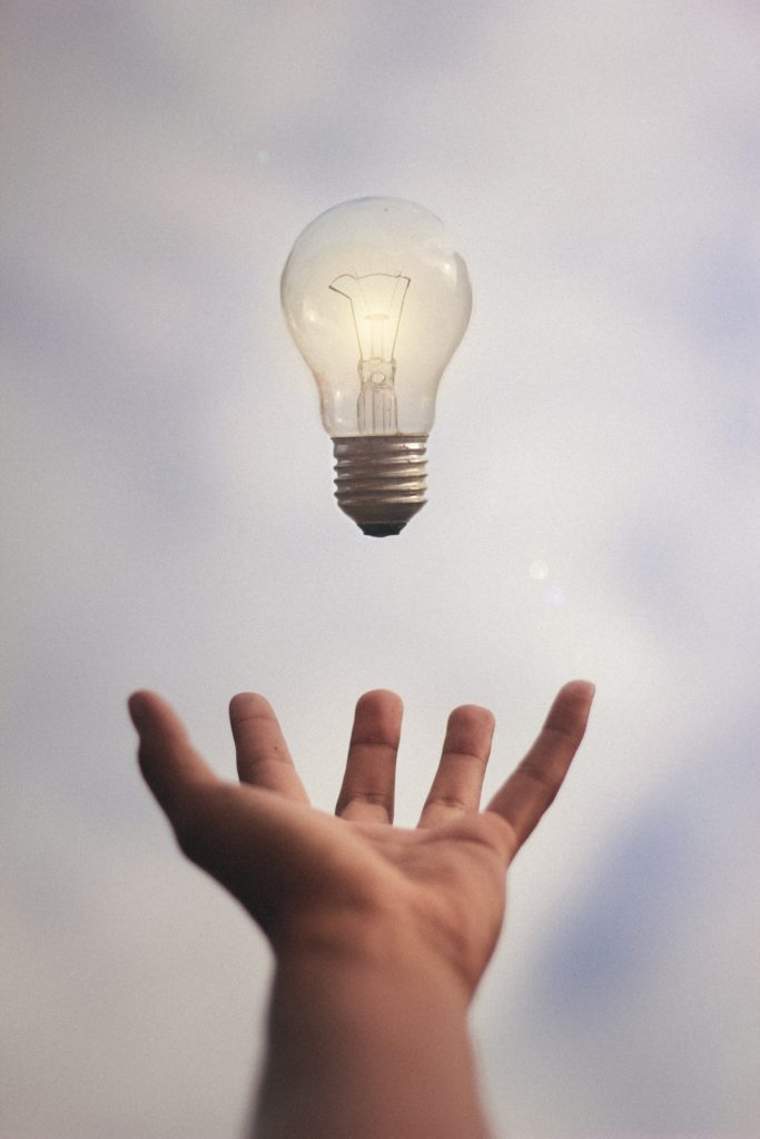 Image of a light bulb shining representing an employee idea.