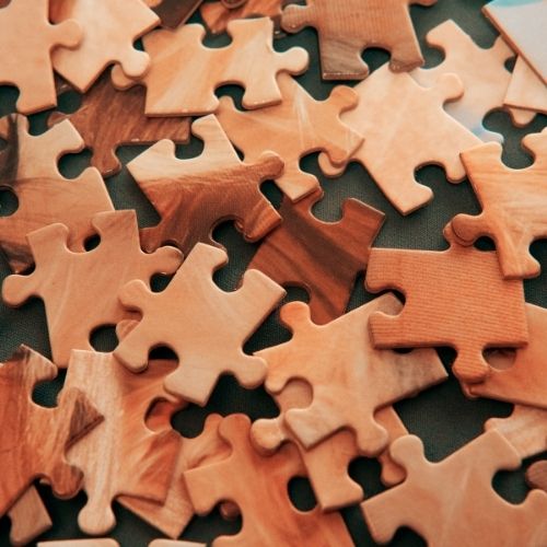Image of puzzle pieces representing a diverse workforce.