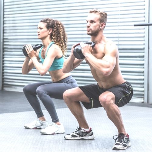 Image of 2 people exercising. 