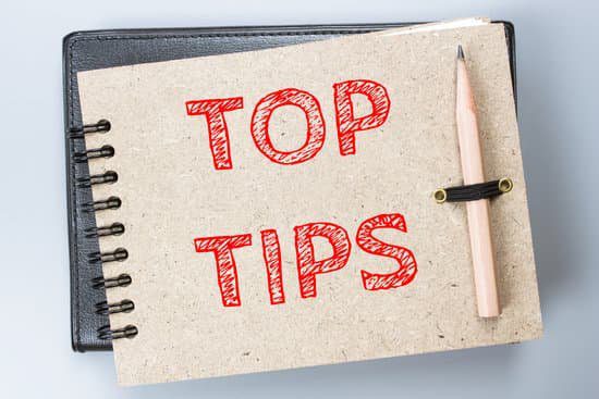 Image of a notebook with top tips written on it for the work from home tips section.