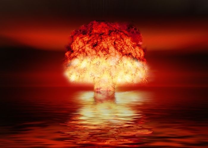 How to Lead Through a Crisis! 10 Effective Tips Image of an explosion requiring strong crisis leadership.