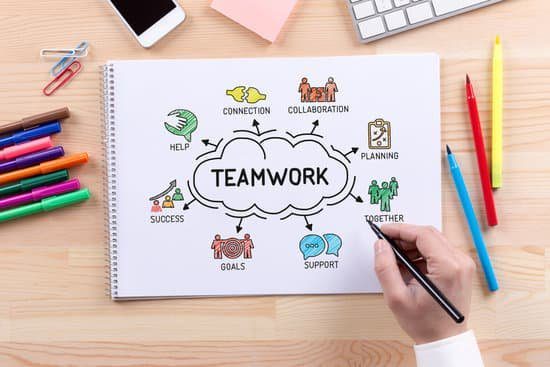Image of a person writing words teamwork, connection, collaboration, planning, together, goals, success, and help.  Team management apps and task management software will help get you there.