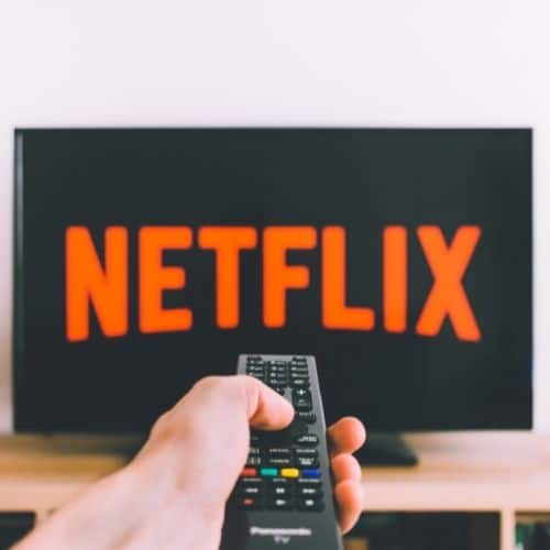 Image of a person watching Netflix.