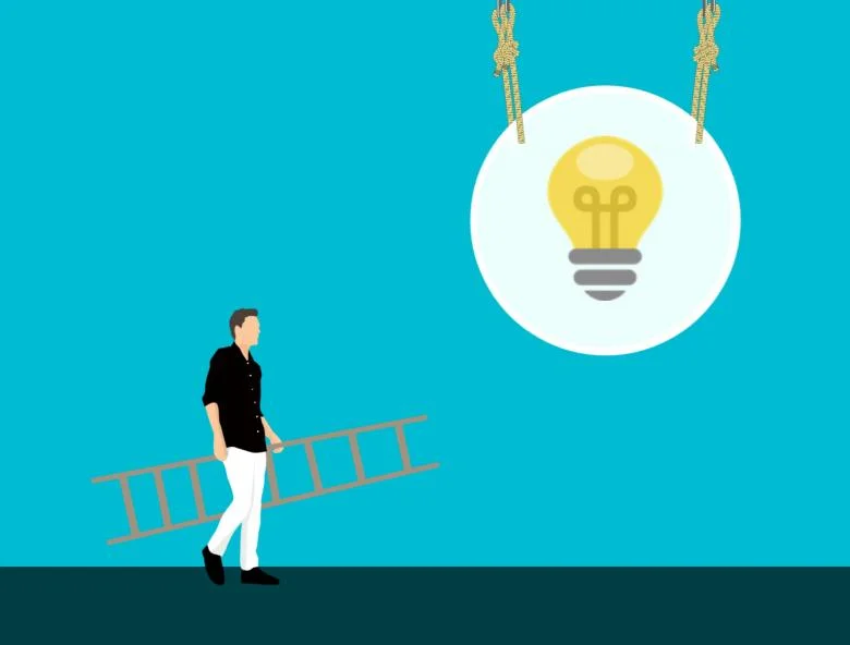 Building Team Cohesion: 12 Proven Strategies for Success Man with ladder walking up to a light bulb.
