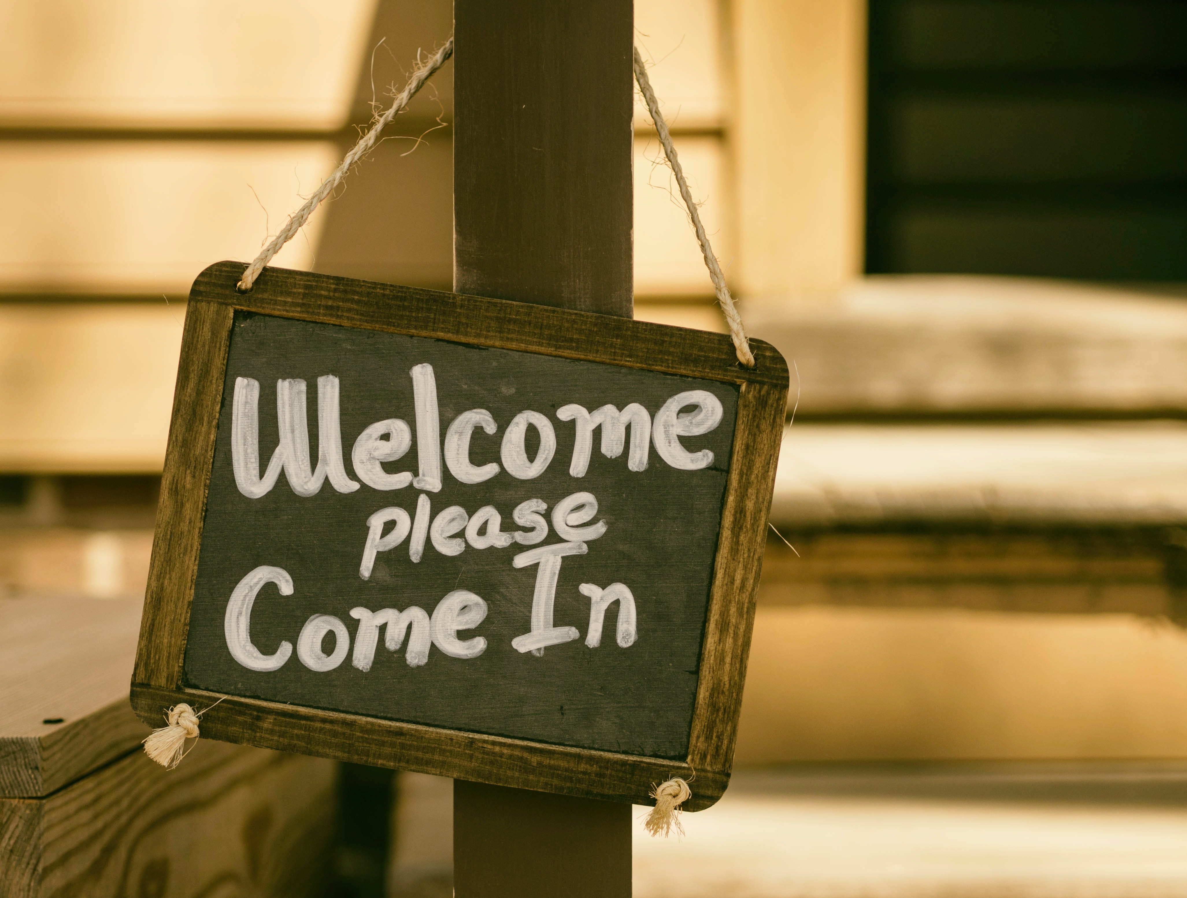 Upward Communication: How to Foster It In Your Team Sign that says welcome please come in.