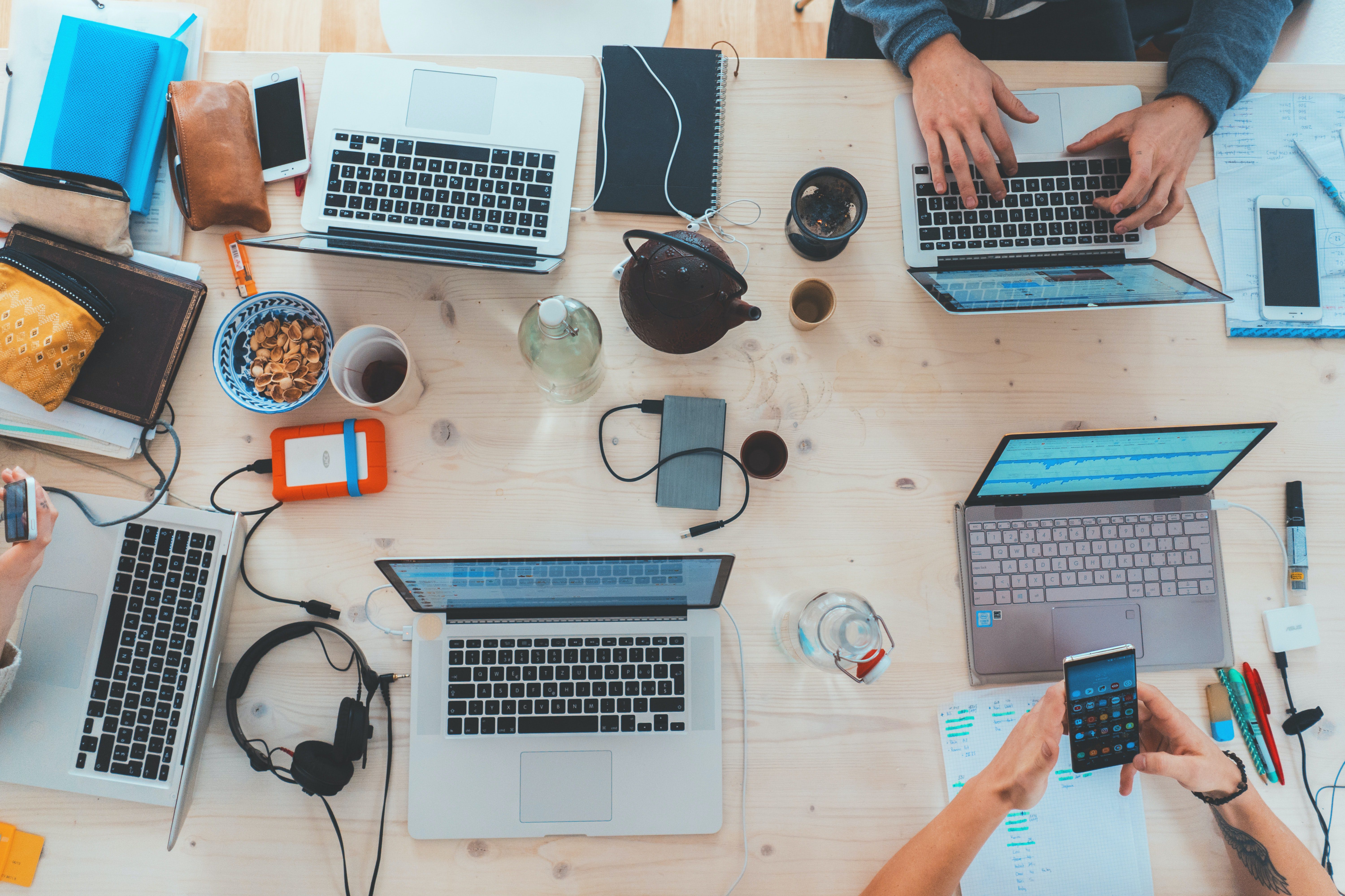 What Is Thought Leadership? How to Become One People on laptops.