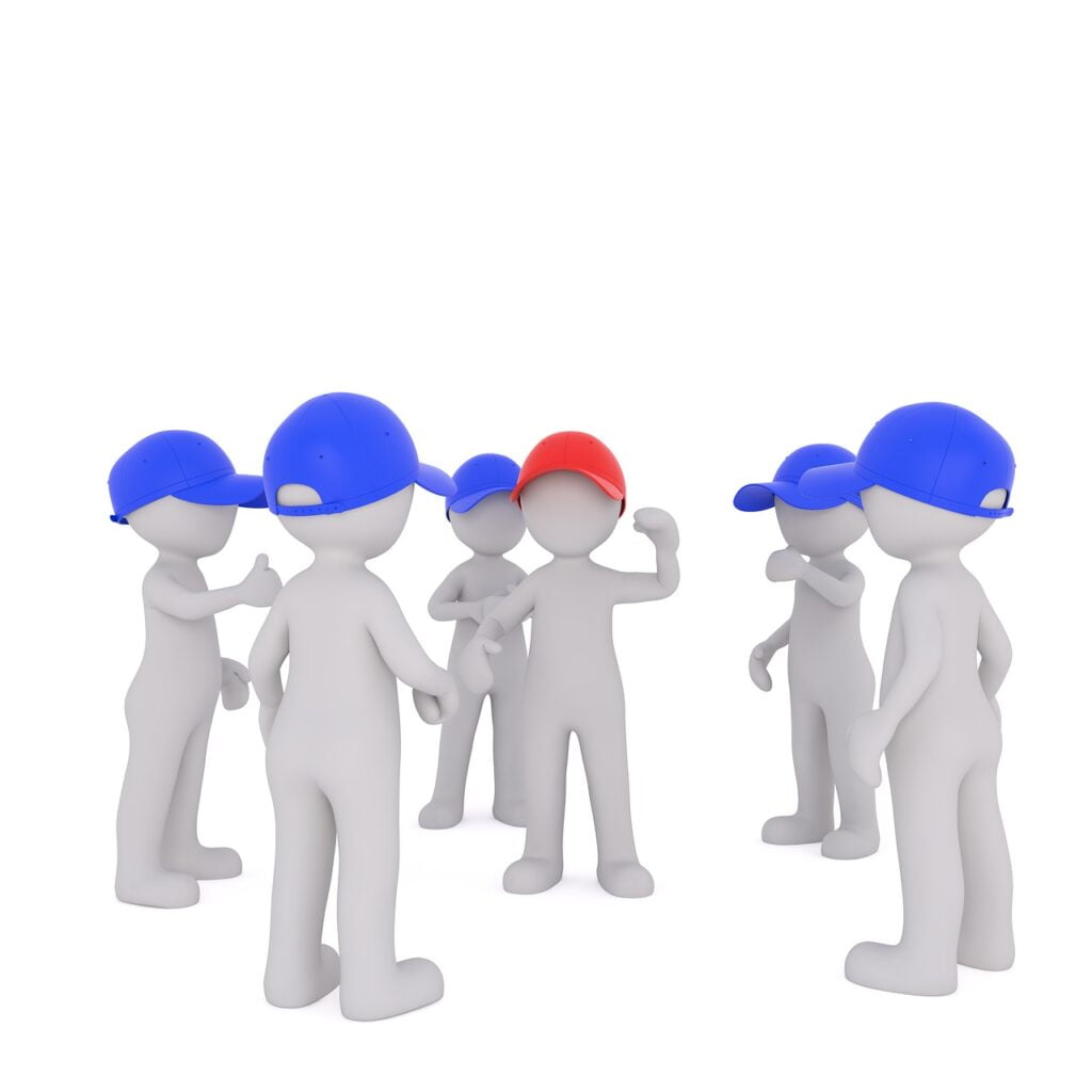 Why Leadership is Important and How It Drives Success a group of employees around a leader explaining why leadership is important.