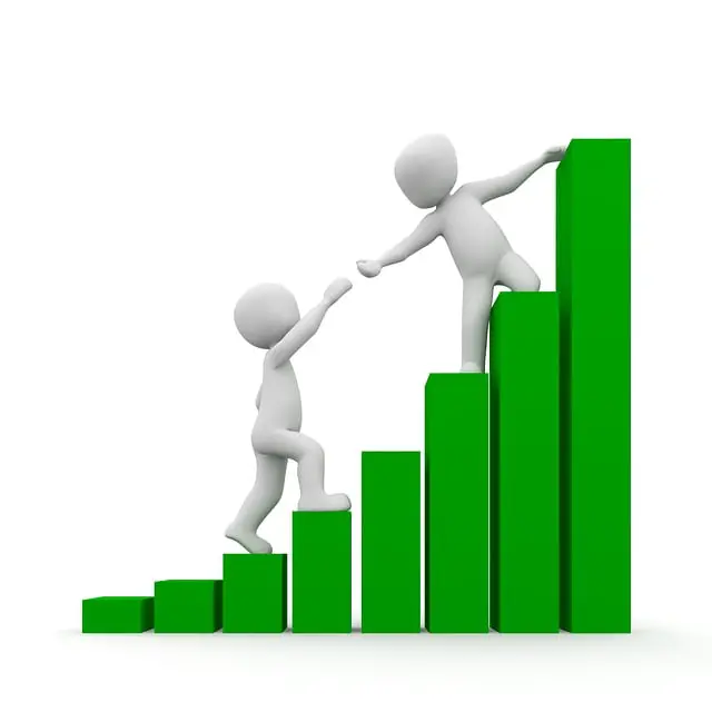 What Is a Personal Mission Statement? How to Write Yours A white figure extending a hand to help another white figure achieve their personal missions.