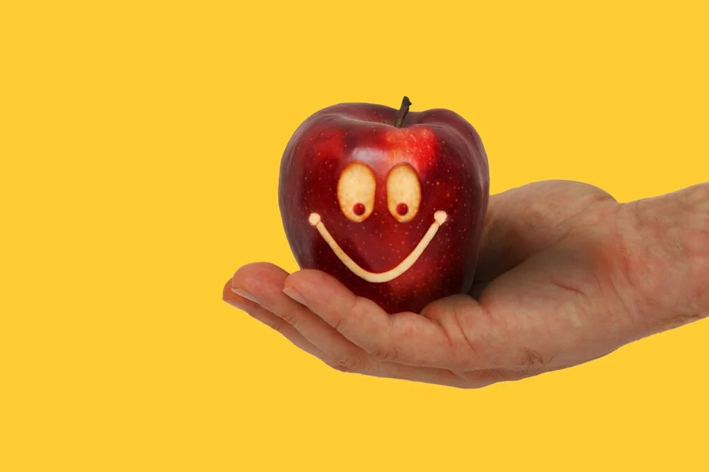 Practical Strategies for Taking Over an Existing Team Successfully apple, hand, smile-8056182.jpg