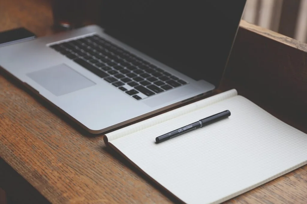 How Do You Prepare for a Group Discussion: Ultimate Guide desk, laptop, notebook